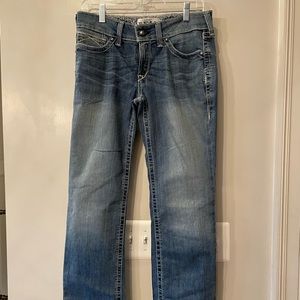 R.E.A.L. Mid Rise Stretch Whipstitch Straight leg Jean